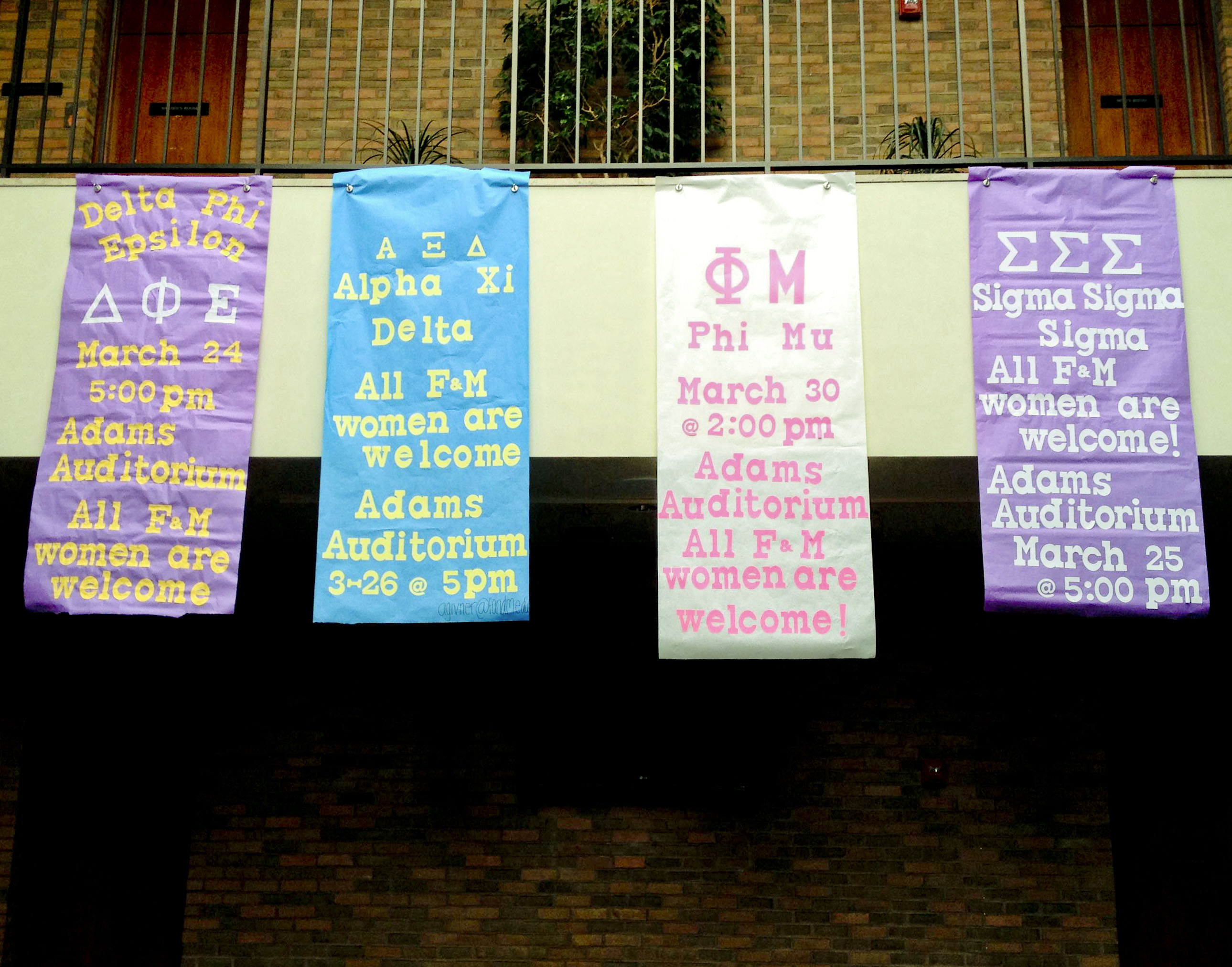 The Panhellenic Council’s Public Relations Committee, during extension, hung banners in the Steinman College Center, promoting them to students. Photo by Scott Onigman '15